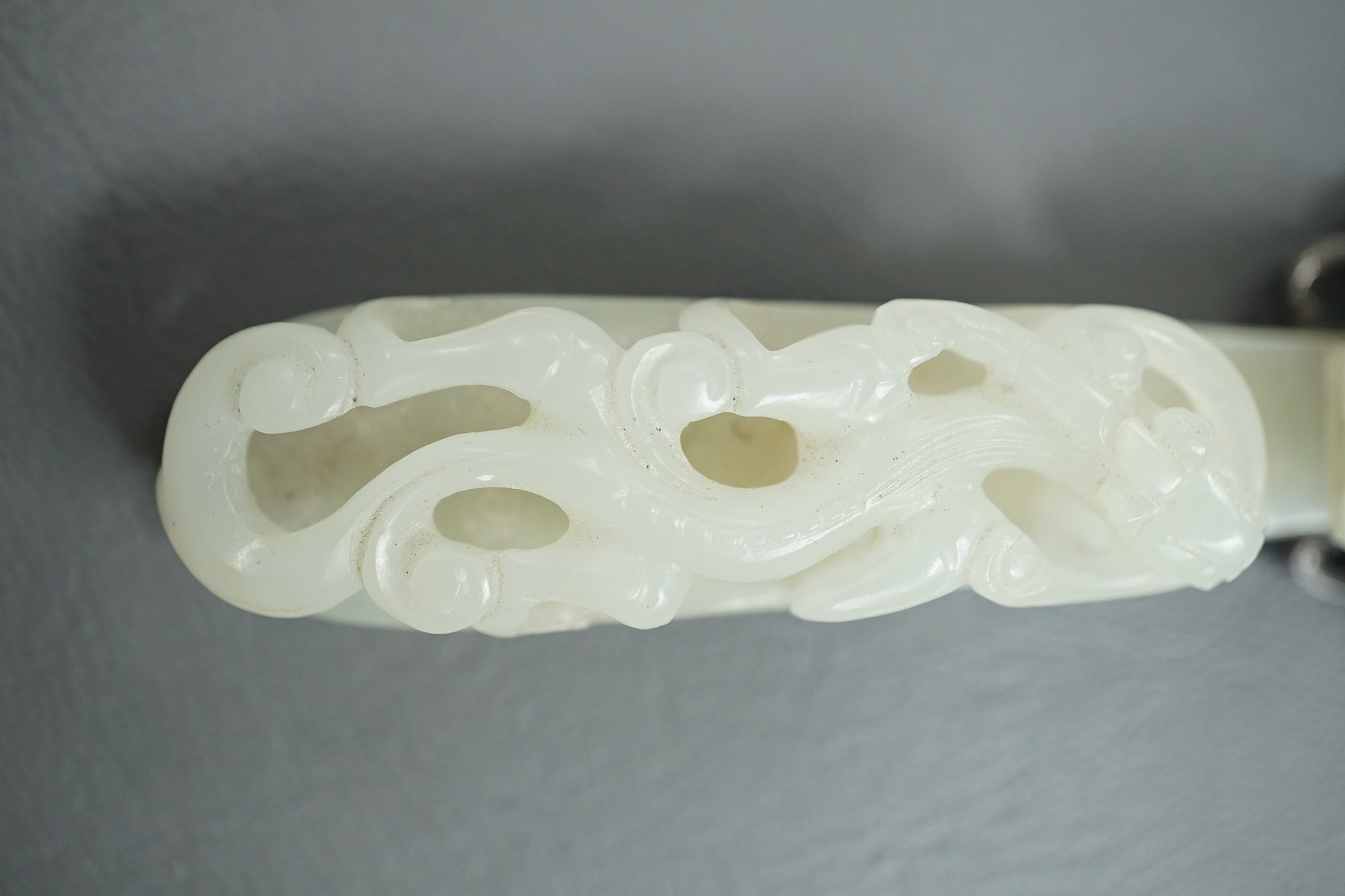 A Chinese jade and cabochon mounted hand mirror, the jade 18th/19th century